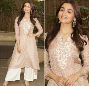 মুম্বাইয়ের এক অনুষ্ঠানে ‘কাপুর’ লেখা শার্ট পরে নজর কাড়লেন আলিয়া ভাট। স্টাইলের মাধ্যমেই কাপুর পরিবারের প্রতি ভালবাসা ও গর্ব প্রকাশ করলেন অভিনেত্রী। Alia Bhatt grabs attention at a Mumbai event by wearing a shirt with ‘Kapoor’ embroidered on it, showcasing her pride and love for the iconic Kapoor family.