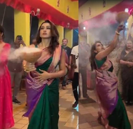দুর্গাপুজোয় গোলাপি বেনারসি পরে ধুনিচি নাচে মাতলেন মিমি চক্রবর্তী।